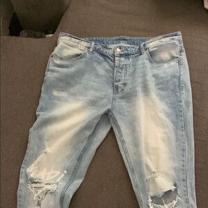 Distressed Light Wash Denim Jeans
